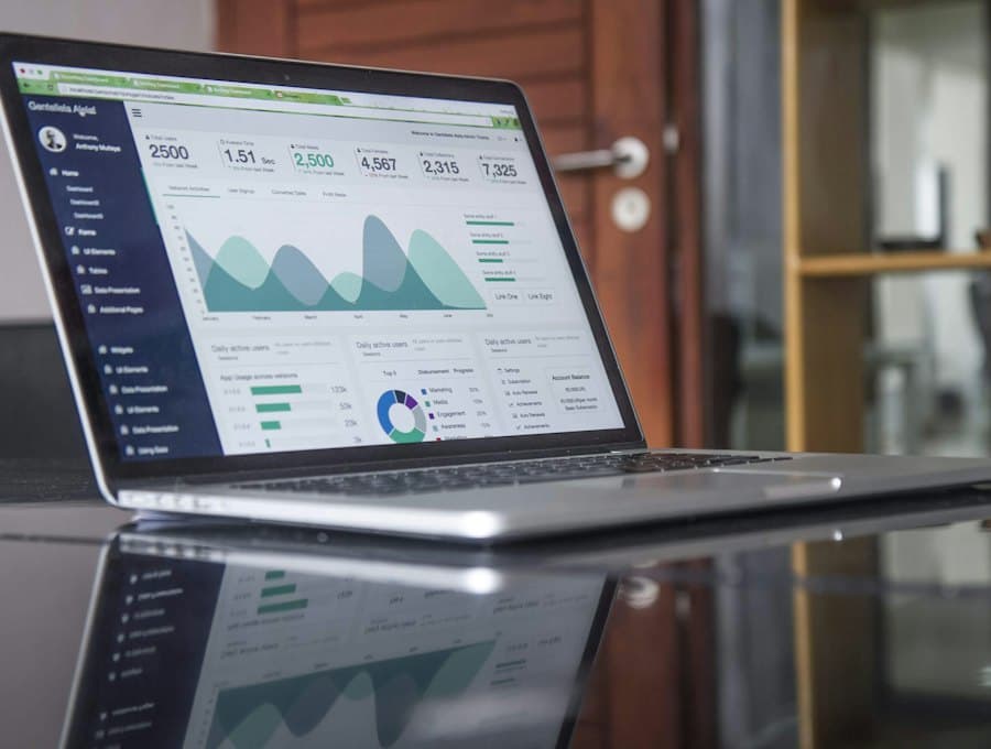A laptop showing website traffic reports